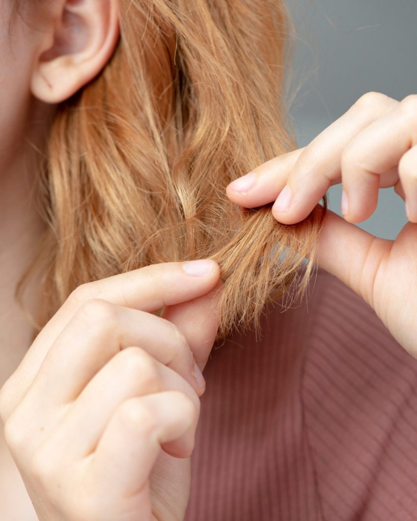 Solito profumo solido naturale sui capelli